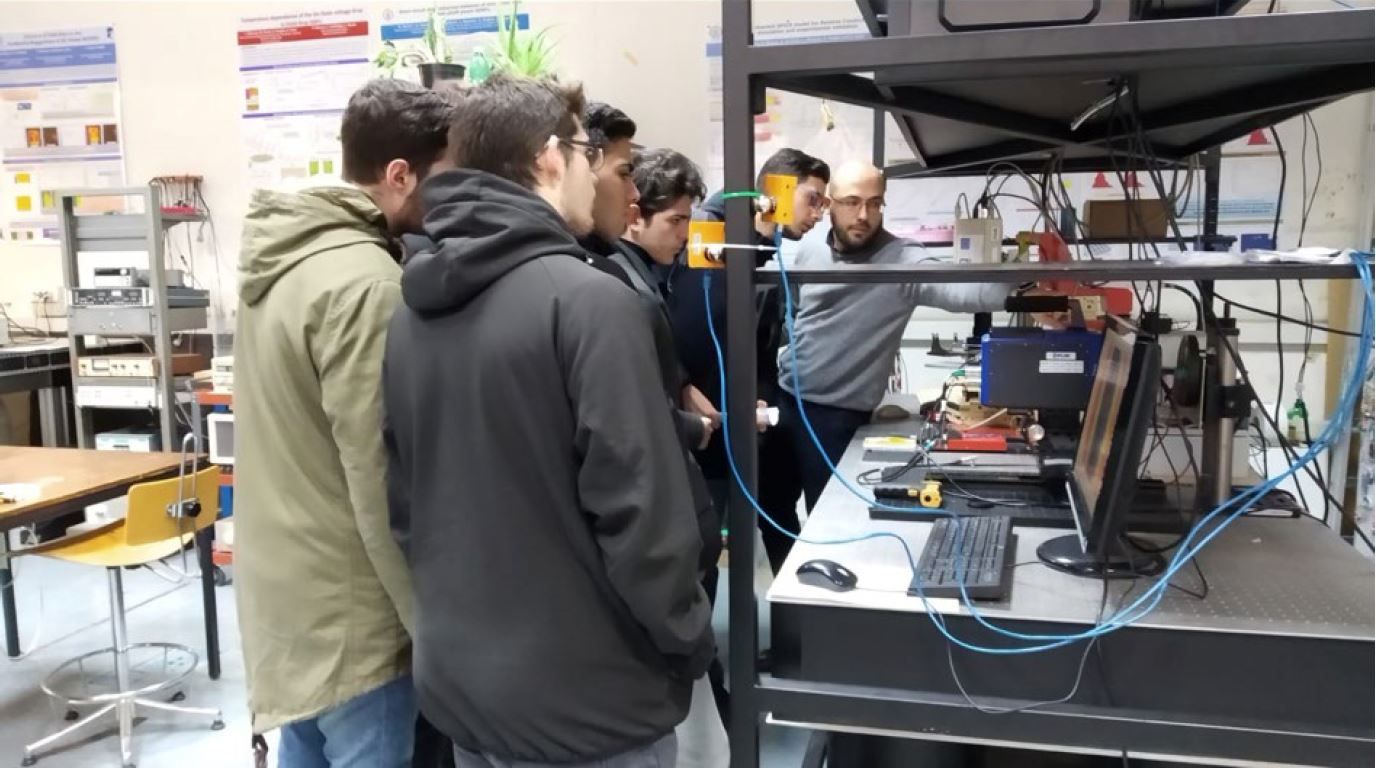 Engineering students at University of Naples watching a demonstration