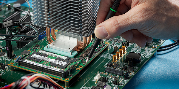 Close-up image of a probe being used to make a measurement on a device under test.