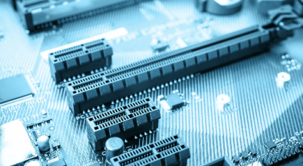 Close-up view of a computer motherboard showing various semiconductor components
