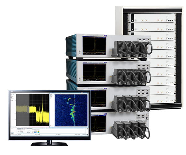 Side-by-side image of the Tektronix DPO70000SX and the 6 Series low profile digitizers in a rack mount configuration. Next to the products is a monitor showing a PDV measurement on the screen.